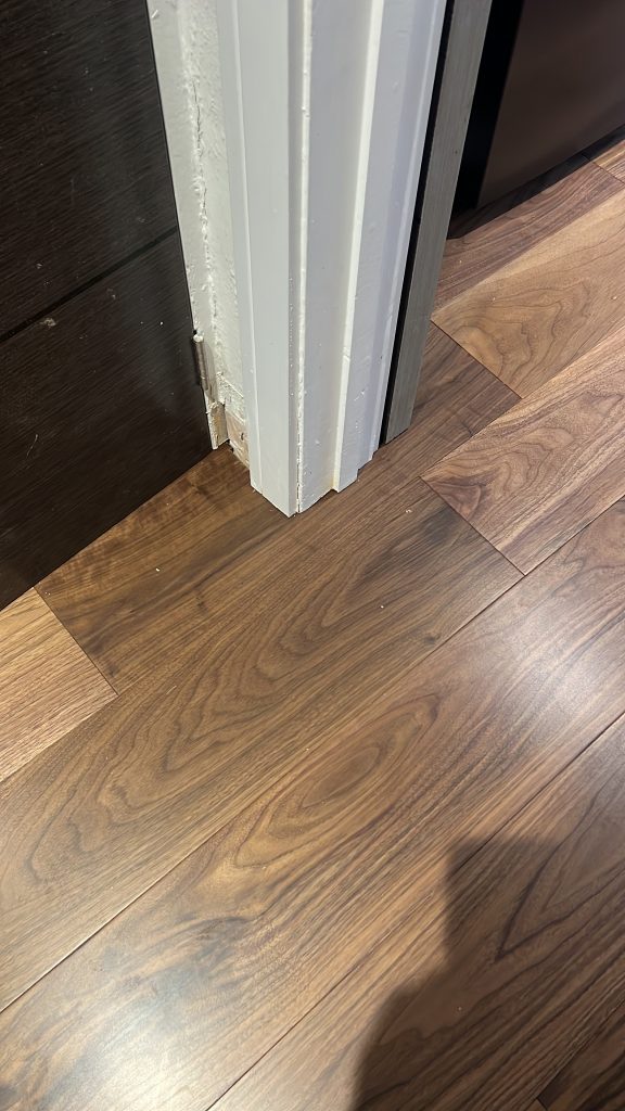 cutting flooring around door 