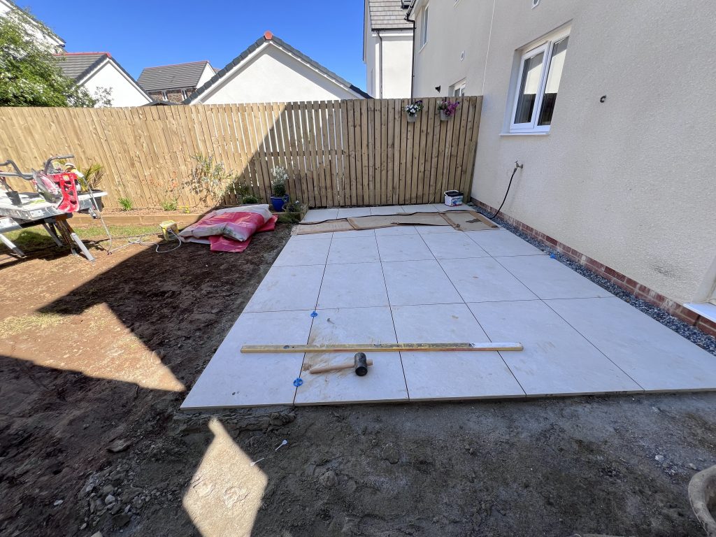 a yard with a fence and a fence