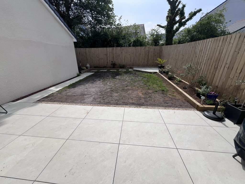 a yard with a fence and a fence